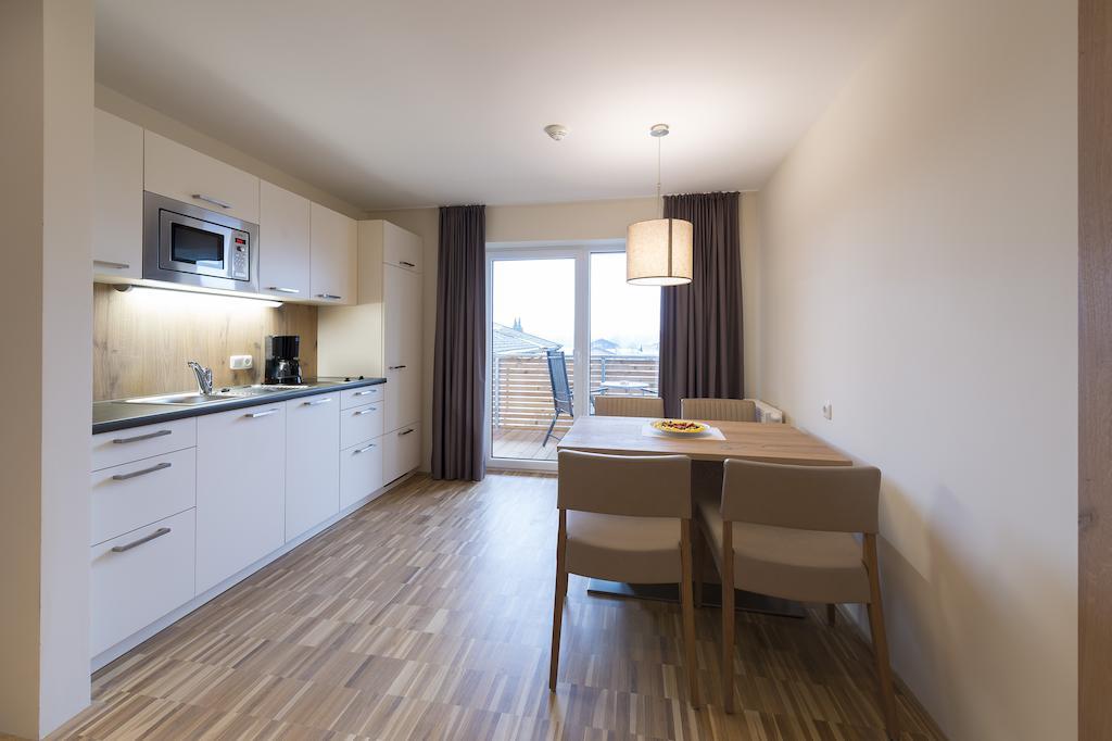 Appartementhotel Sonnenhof Kössen Rum bild