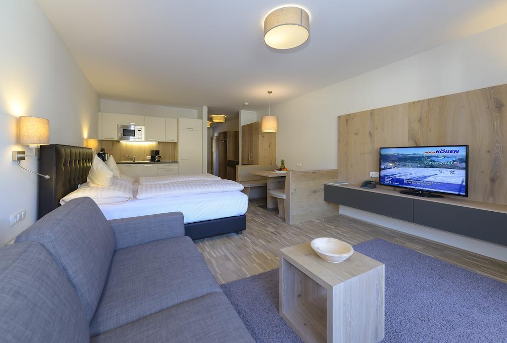 Appartementhotel Sonnenhof Kössen Rum bild