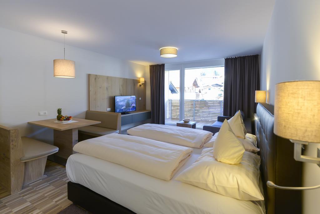 Appartementhotel Sonnenhof Kössen Rum bild
